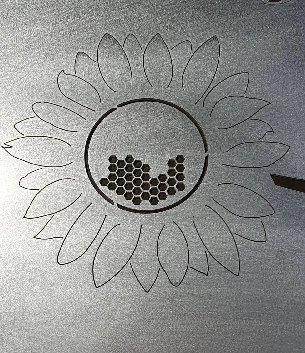 Sunflower and honeycomb pattern cut by Scott's Steelworkz
