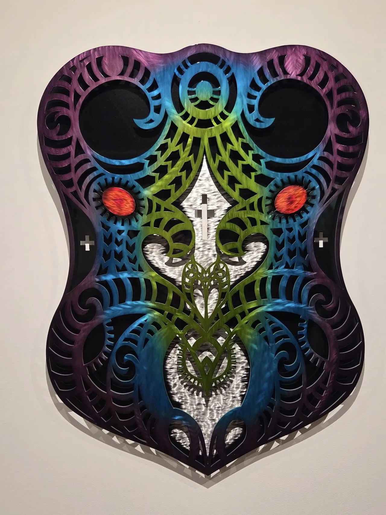 Rainbow Maori-inspired shield artwork cut by Scott's Steelworkz