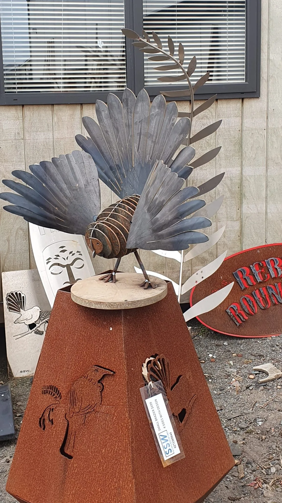 Fantail and fern brazier display by Scott's Steelworkz
